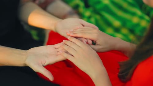 Three Hands Together: Unity, Family, and Support