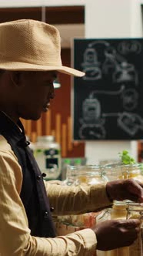 Vertical Video African American Seller Preparing Local Farmers Market Products