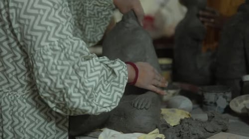 Sculptor s Hands Working Large Piece of Clay in a Creative Workshop