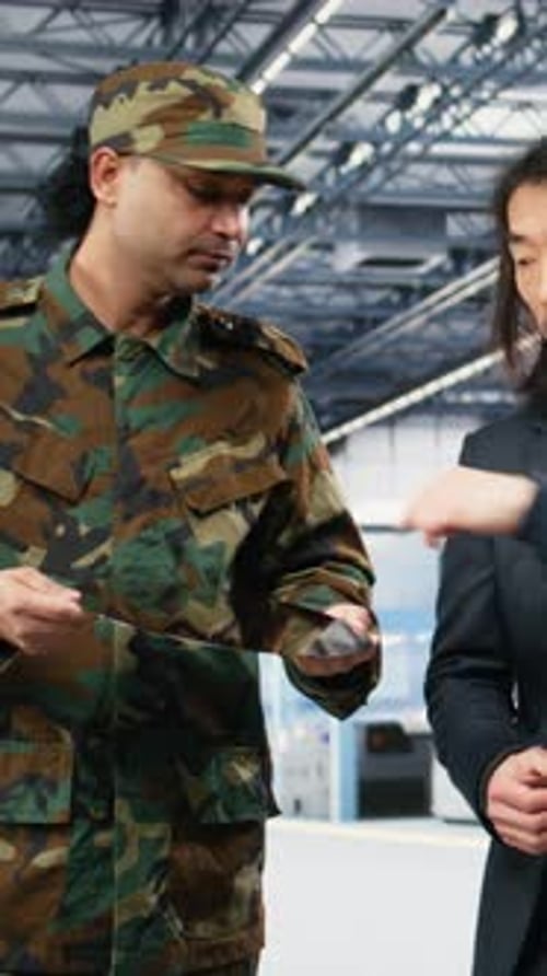 Vertical Video Microelectronics Factory Manager and Soldier Increase Production of Microchips