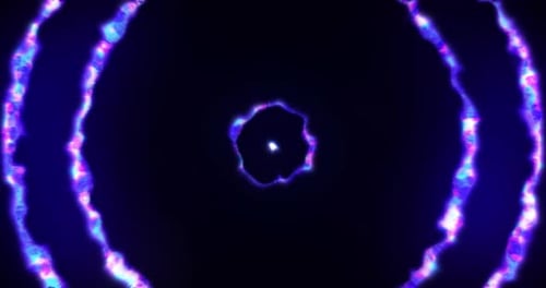 Abstract background looped circles a tunnel of flying purple blue rings of energy plasma with a glow