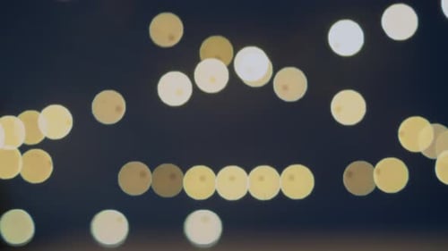 Festive City Street With Christmas Star Lights And Bokeh Glow
