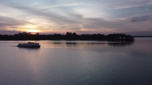 river boat sunset beautiful colorful mirrored drone
