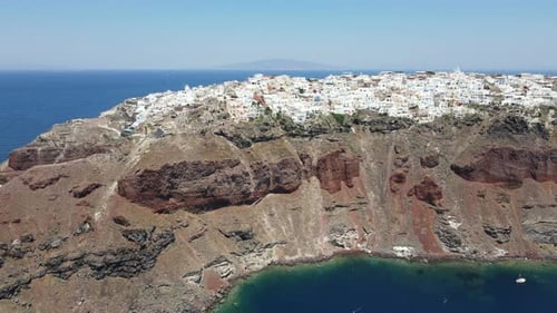 A Stunning Wide Angle Drone Journey Over the Iconic Village of Oia in Santorini