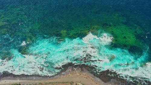Wander along the wild and windswept coastline of Tenerife Island in Spain