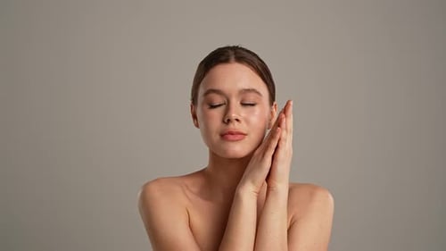 Woman Posing with Hands Near Face