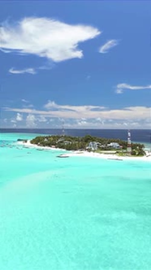Aerial View of Tropical Island with Turquoise Lagoon