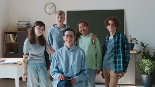 Students and Teacher Smiling in Classroom