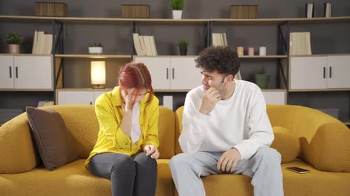 Couple Experiencing Difficulties: Tears and Emotional Distress