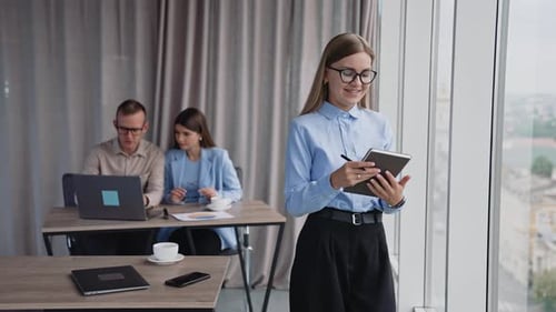 Professional Woman Smiling in Urban Office Setting