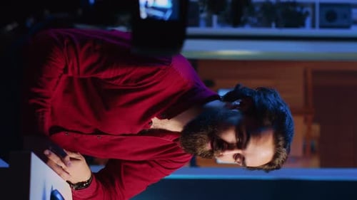 Designer Working Late on Digital Tablet