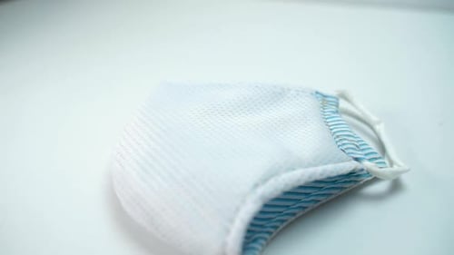 Close up of single face mask is prepare to use to prevent corona-virus or covid-19 disease