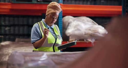 Black woman, tablet and inventory management with logistics at warehouse