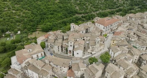 Aerial view of buildings with red tile roofs, Italy.