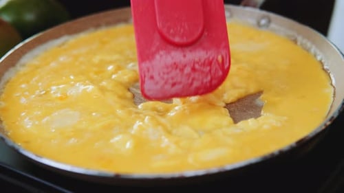 Making Fresh Scrambled Eggs in a Pan