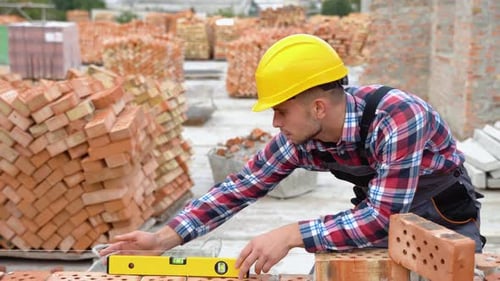 Worker Control Brick Wall Using Level Tool