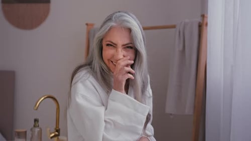 Old Caucasian Smiling Laughing Lady 60s Female Smile Laugh Happy Senior Mature Woman Looking at