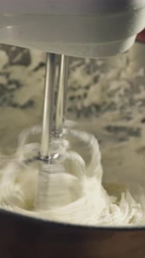 Vertical View Of An Electric Hand Mixer For Baking. Close-up Shot