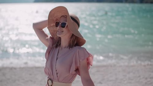 Woman on the Beach Enjoying Sunset Near Lake