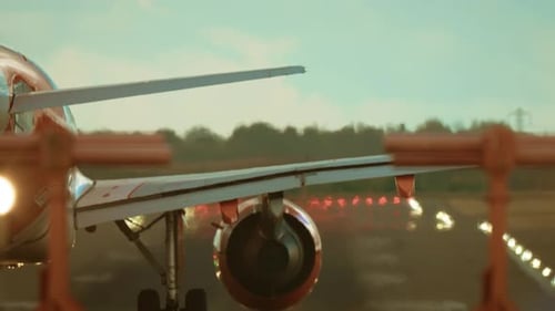 Jetliner Warming Turbines and Beginning Takeoff Roll on Runway Airplane Running Engines and