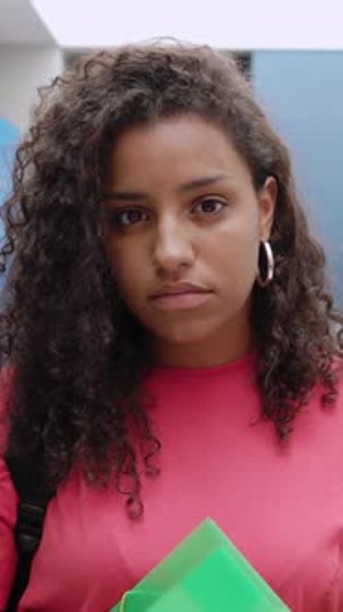Portrait of Happy Hispanic Latin Young Student Woman at High School