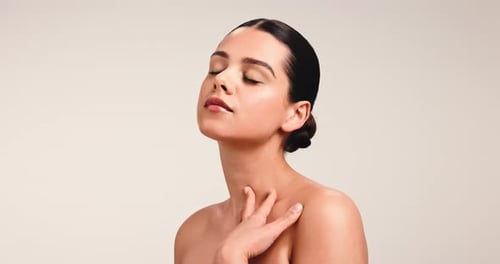 Shoulder, beauty and skincare with woman in studio for aesthetic, glow and skin wellness
