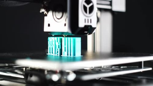 Close View of 3D Printer Forming a Plastic Model