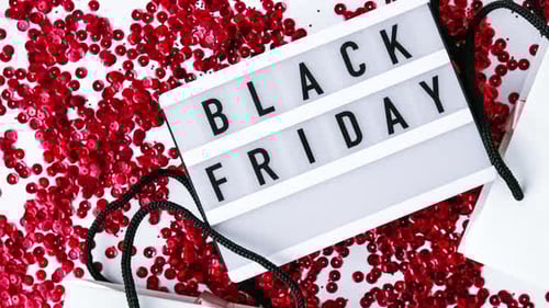 Black Friday Text and Shopping Bag Arrangement