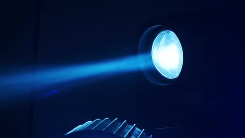 Dramatic Blue Light Beam in Dark Setting