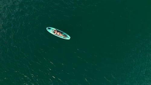 Aerial View Adventure Through the Vast Green Canyon By Paddleboard
