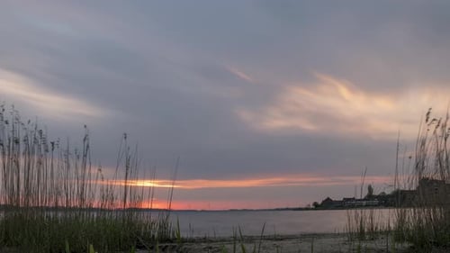 4K time lapse of the sun rising at the lake Gooimeer, in Huizen, The Netherlands. Taken on April 18,
