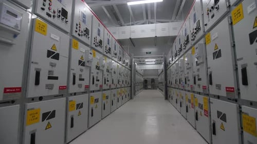 Motion Along Hallway with Switch Gear in Cases at Station