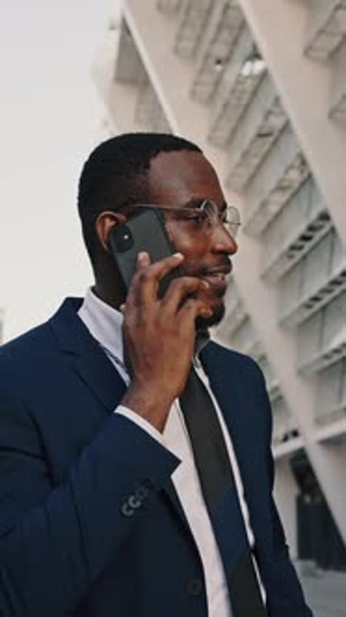 Successful Business Negotiations Cheerful African American Businessman Talking with Partners