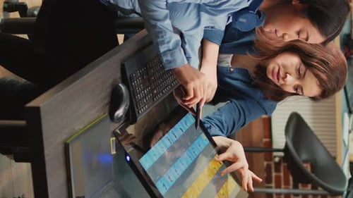 Two Women Working Together on Digital Design