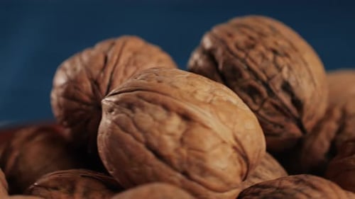 Walnuts in a Shell Rotating Top View Healthy Snacks Product Rich in Minerals and Vitamins