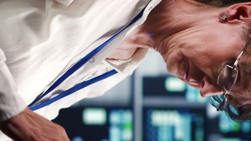 Woman Using Tablet in Technological Workplace