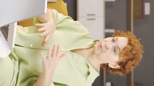 Woman Typing on Computer Then Massaging Head