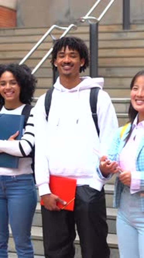 Happy Students Posing Smiling at Camera in the Campus