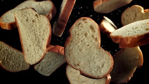 Sliced Pieces of Bread Fly Up and Fall Down Filmed on a Highspeed Camera at 1000 Fps