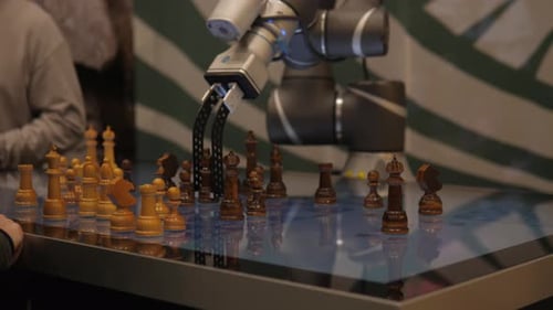 Robot Arm Plays Chess on Digital Board