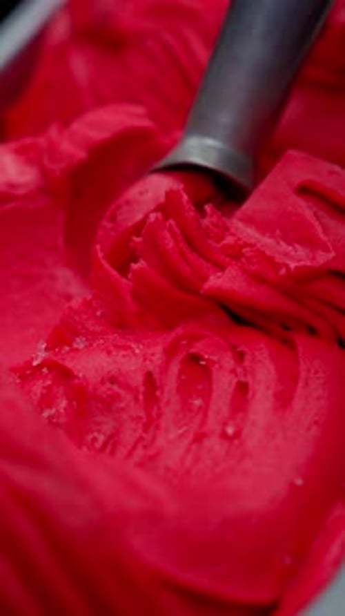 Delicious Raspberry Heart-Shaped Ice Cream with Fresh Raspberries.