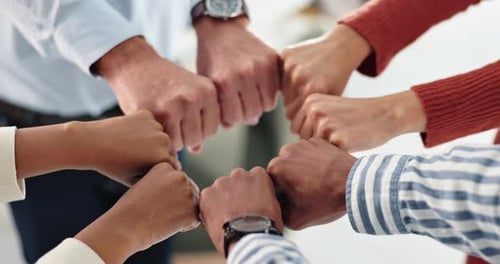 Business people, group circle and fist for teamwork with support, motivation