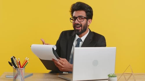 Business Man Reading Business Contract Analyzing Resume Satisfied with Good Paperwork Results
