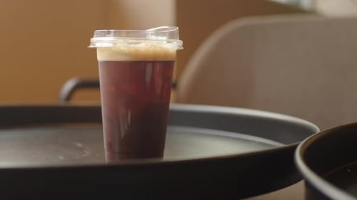 Iced Coffee Served on a Table in a Cafe