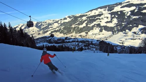 Skiing during a sunny winter day.