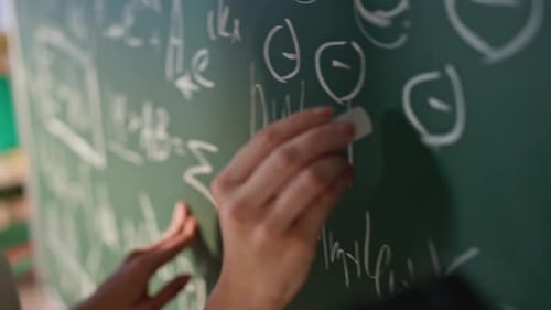 Closeup Educator Writing Chalkboard at Mathematics School Lesson Woman Teaching