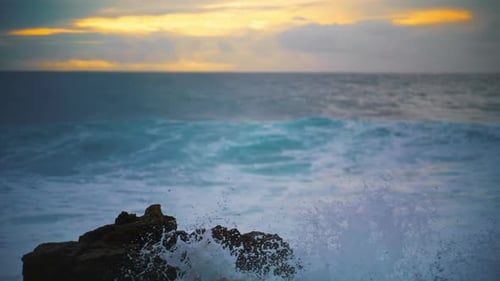 Ocean Hitting Coastline Rock in Early Morning Closeup. Beautiful Evening Seaside Surf