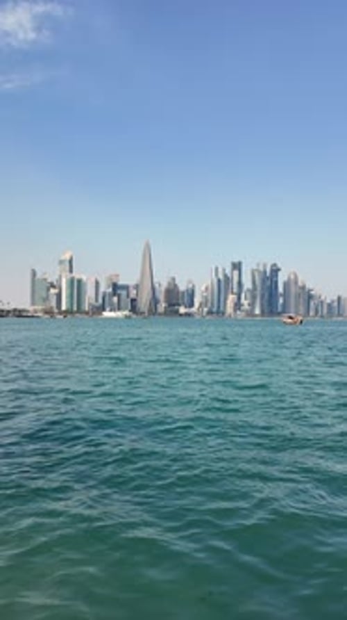 City Skyline with Modern Architecture Viewed From the Water at Qatar