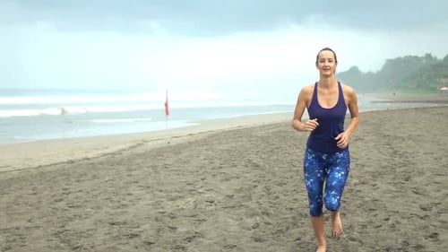 Sportive Female Jogging On Beach, Super Slow Motion 240fps