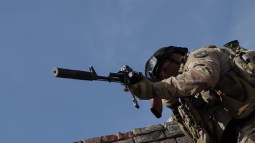 The Soldier Aimed His Weapon to Shoot at the Enemy